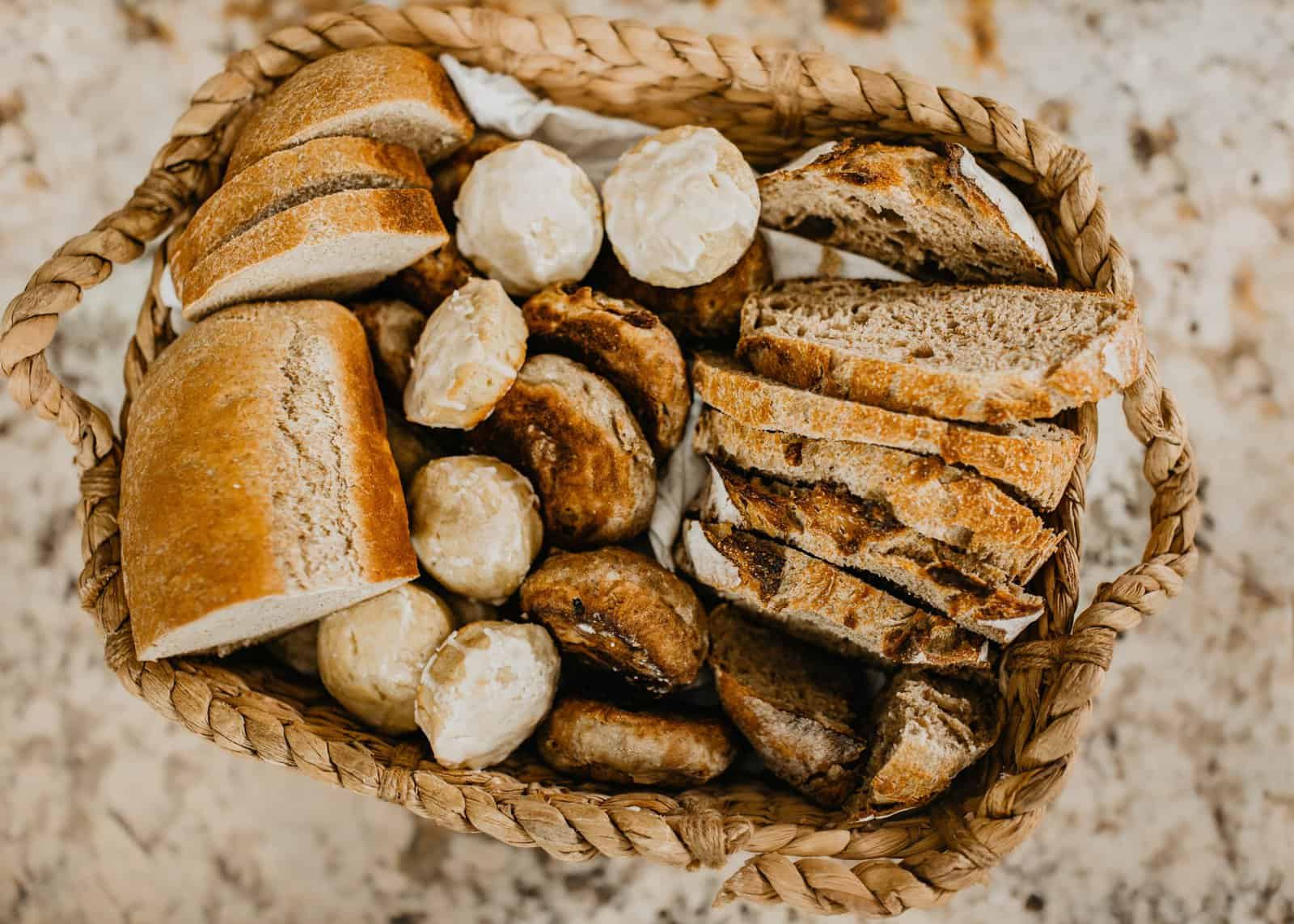 whicker basket full of bread products