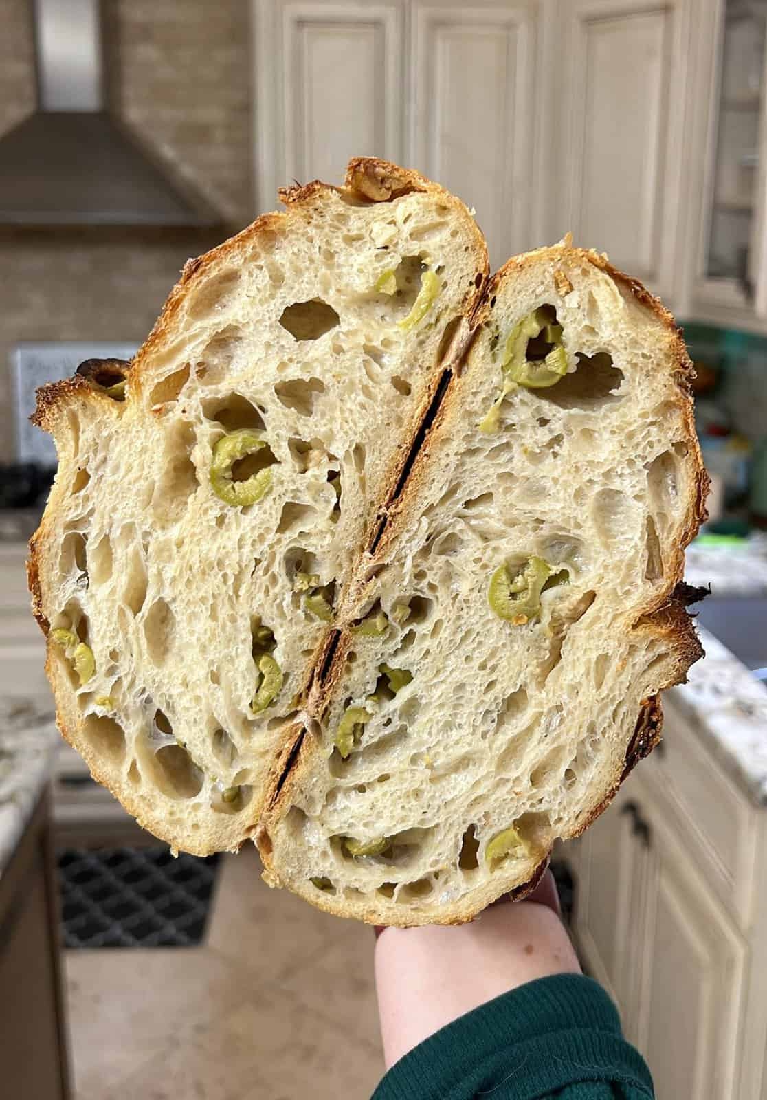 Sourdough loaf stuffed with roasted garlic and olives.